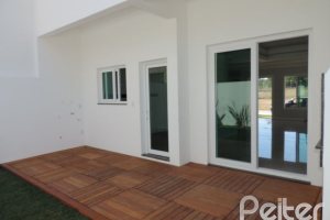 Casa em Condomínio à venda com 164m², 3 dormitórios, 1 suíte, 2 vagas, no bairro Hípica em PORTO ALEGRE