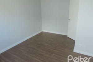 Casa em Condomínio à venda com 164m², 3 dormitórios, 1 suíte, 2 vagas, no bairro Hípica em PORTO ALEGRE