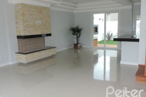 Casa em Condomínio à venda com 164m², 3 dormitórios, 1 suíte, 2 vagas, no bairro Hípica em PORTO ALEGRE