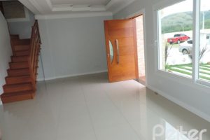 Casa em Condomínio à venda com 164m², 3 dormitórios, 1 suíte, 2 vagas, no bairro Hípica em PORTO ALEGRE