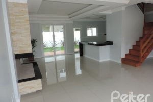 Casa em Condomínio à venda com 164m², 3 dormitórios, 1 suíte, 2 vagas, no bairro Hípica em PORTO ALEGRE