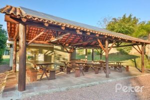 Casa em Condomínio à venda com 450m², 6 dormitórios, 4 suítes, 2 vagas, no bairro Terra Ville em Porto Alegre