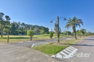 Casa em Condomínio à venda com 450m², 6 dormitórios, 4 suítes, 2 vagas, no bairro Terra Ville em Porto Alegre