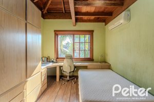 Casa em Condomínio à venda com 450m², 6 dormitórios, 4 suítes, 2 vagas, no bairro Terra Ville em PORTO ALEGRE