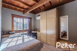 Casa em Condomínio à venda com 450m², 6 dormitórios, 4 suítes, 2 vagas, no bairro Terra Ville em PORTO ALEGRE