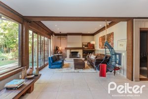 Casa em Condomínio à venda com 450m², 6 dormitórios, 4 suítes, 2 vagas, no bairro Terra Ville em PORTO ALEGRE