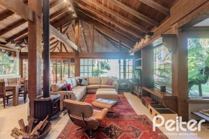Casa em Condomínio à venda com 450m², 6 dormitórios, 4 suítes, 2 vagas, no bairro Terra Ville em PORTO ALEGRE