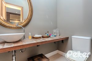 Casa em Condomínio à venda com 450m², 6 dormitórios, 4 suítes, 2 vagas, no bairro Terra Ville em PORTO ALEGRE