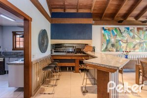 Casa em Condomínio à venda com 450m², 6 dormitórios, 4 suítes, 2 vagas, no bairro Terra Ville em PORTO ALEGRE