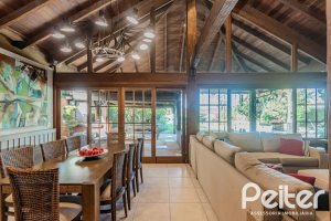 Casa em Condomínio à venda com 450m², 6 dormitórios, 4 suítes, 2 vagas, no bairro Terra Ville em PORTO ALEGRE