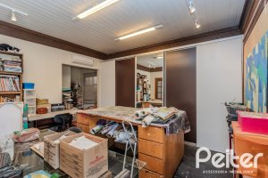 Casa em Condomínio à venda com 450m², 6 dormitórios, 4 suítes, 2 vagas, no bairro Terra Ville em PORTO ALEGRE