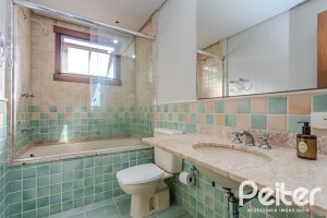 Casa em Condomínio à venda com 450m², 6 dormitórios, 4 suítes, 2 vagas, no bairro Terra Ville em PORTO ALEGRE