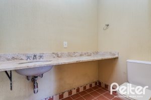 Casa em Condomínio à venda com 450m², 6 dormitórios, 4 suítes, 2 vagas, no bairro Terra Ville em PORTO ALEGRE