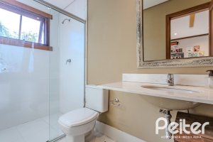 Casa em Condomínio à venda com 450m², 6 dormitórios, 4 suítes, 2 vagas, no bairro Terra Ville em PORTO ALEGRE