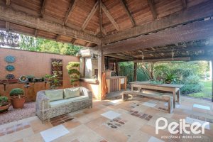 Casa em Condomínio à venda com 450m², 6 dormitórios, 4 suítes, 2 vagas, no bairro Terra Ville em PORTO ALEGRE