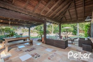 Casa em Condomínio à venda com 450m², 6 dormitórios, 4 suítes, 2 vagas, no bairro Terra Ville em PORTO ALEGRE