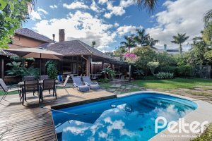 Casa em Condomínio à venda com 450m², 6 dormitórios, 4 suítes, 2 vagas, no bairro Terra Ville em PORTO ALEGRE