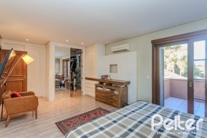 Casa em Condomínio à venda com 450m², 6 dormitórios, 4 suítes, 2 vagas, no bairro Terra Ville em PORTO ALEGRE