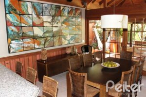 Casa em Condomínio à venda com 450m², 6 dormitórios, 4 suítes, 2 vagas, no bairro Terra Ville em Porto Alegre