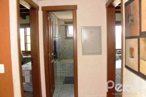 Casa em Condomínio à venda com 450m², 6 dormitórios, 4 suítes, 2 vagas, no bairro Terra Ville em Porto Alegre