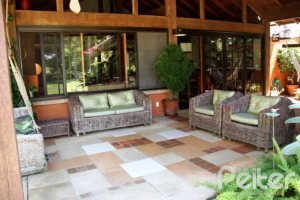 Casa em Condomínio à venda com 450m², 6 dormitórios, 4 suítes, 2 vagas, no bairro Terra Ville em Porto Alegre