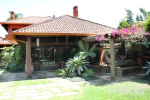 Casa em Condomínio à venda com 450m², 6 dormitórios, 4 suítes, 2 vagas, no bairro Terra Ville em Porto Alegre