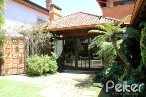 Casa em Condomínio à venda com 450m², 6 dormitórios, 4 suítes, 2 vagas, no bairro Terra Ville em Porto Alegre