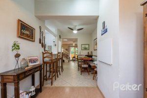 Casa em Condomínio à venda com 159m², 3 dormitórios, 1 suíte, 2 vagas, no bairro Tristeza em Porto Alegre