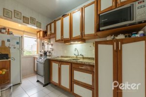 Casa em Condomínio à venda com 159m², 3 dormitórios, 1 suíte, 2 vagas, no bairro Tristeza em Porto Alegre