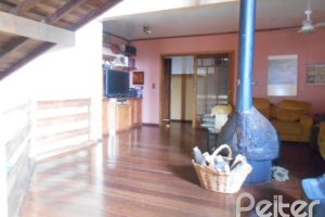 Casa à venda com 404m², 4 dormitórios, 1 suíte, 3 vagas, no bairro Vila Assunção em Porto Alegre