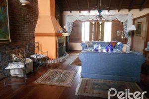 Casa à venda com 404m², 4 dormitórios, 1 suíte, 3 vagas, no bairro Vila Assunção em Porto Alegre