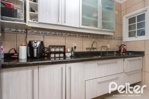 Casa em Condomínio à venda com 184m², 3 dormitórios, 1 suíte, 2 vagas, no bairro Vila Assunção em Porto Alegre