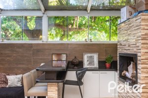 Casa em Condomínio à venda com 184m², 3 dormitórios, 1 suíte, 2 vagas, no bairro Vila Assunção em Porto Alegre