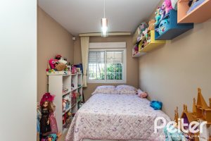 Casa em Condomínio à venda com 184m², 3 dormitórios, 1 suíte, 2 vagas, no bairro Vila Assunção em Porto Alegre