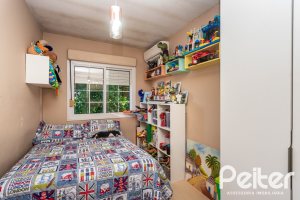 Casa em Condomínio à venda com 184m², 3 dormitórios, 1 suíte, 2 vagas, no bairro Vila Assunção em Porto Alegre