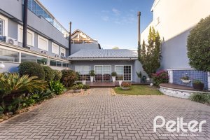 Casa em Condomínio à venda com 184m², 3 dormitórios, 1 suíte, 2 vagas, no bairro Vila Assunção em Porto Alegre