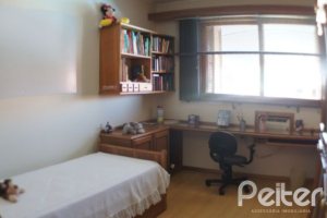 Casa à venda com 324m², 3 dormitórios, 1 suíte, 4 vagas, no bairro Tristeza em Porto Alegre