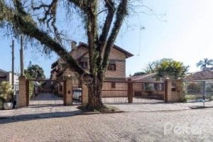 Casa em Condomínio à venda com 145m², 3 dormitórios, 1 suíte, 1 vaga, no bairro Jardim Isabel em Porto Alegre