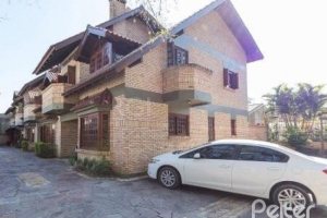 Casa em Condomínio à venda com 145m², 3 dormitórios, 1 suíte, 1 vaga, no bairro Jardim Isabel em Porto Alegre