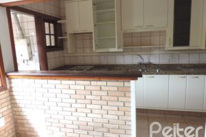 Casa em Condomínio à venda com 145m², 3 dormitórios, 1 suíte, 1 vaga, no bairro Jardim Isabel em Porto Alegre
