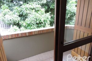 Casa em Condomínio à venda com 145m², 3 dormitórios, 1 suíte, 1 vaga, no bairro Jardim Isabel em Porto Alegre