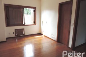 Casa em Condomínio à venda com 145m², 3 dormitórios, 1 suíte, 1 vaga, no bairro Jardim Isabel em Porto Alegre
