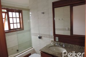 Casa em Condomínio à venda com 145m², 3 dormitórios, 1 suíte, 1 vaga, no bairro Jardim Isabel em Porto Alegre