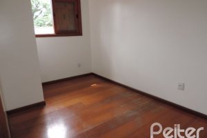 Casa em Condomínio à venda com 145m², 3 dormitórios, 1 suíte, 1 vaga, no bairro Jardim Isabel em Porto Alegre
