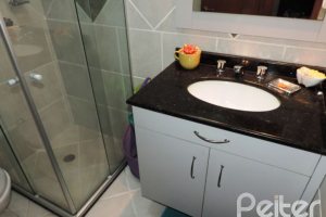 Casa em Condomínio à venda com 194m², 3 dormitórios, 1 suíte, 2 vagas, no bairro Vila Assunção em Porto Alegre