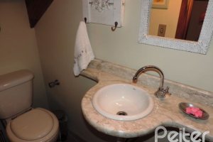 Casa em Condomínio à venda com 194m², 3 dormitórios, 1 suíte, 2 vagas, no bairro Vila Assunção em Porto Alegre