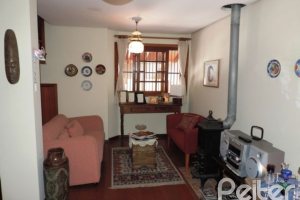 Casa em Condomínio à venda com 194m², 3 dormitórios, 1 suíte, 2 vagas, no bairro Vila Assunção em Porto Alegre