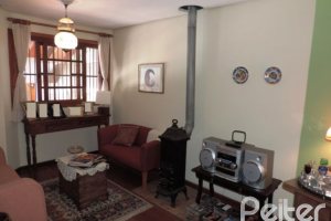 Casa em Condomínio à venda com 194m², 3 dormitórios, 1 suíte, 2 vagas, no bairro Vila Assunção em Porto Alegre