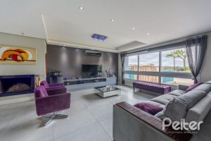 Casa em Condomínio à venda com 346m², 3 dormitórios, 1 suíte, 3 vagas, no bairro Ipanema em PORTO ALEGRE