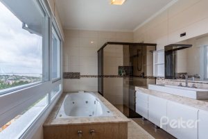 Casa em Condomínio à venda com 346m², 3 dormitórios, 1 suíte, 3 vagas, no bairro Ipanema em PORTO ALEGRE